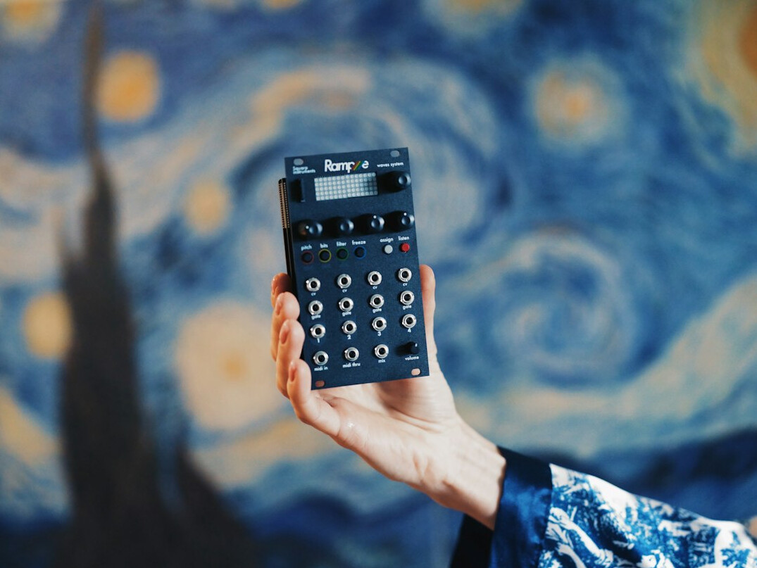 person using calculator for budget