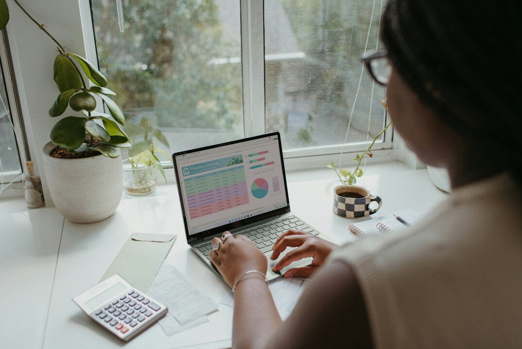 person reviewing budget spreadsheet