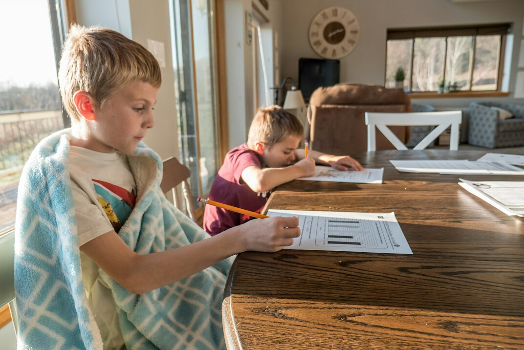 family reviewing bills at home